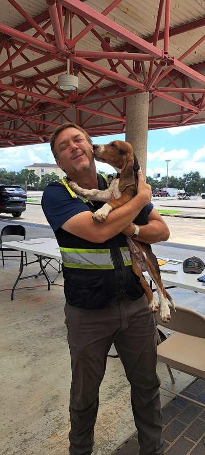 Me with Presley, a dog I met while doing disaster cleanup in Harris County for Tetra Tech.